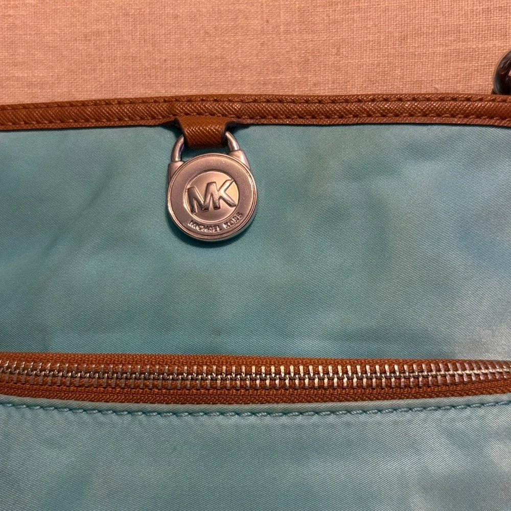 Michael Kors “Kempton” Aquamarine Nylon Crossbody Bag with Leather Trim